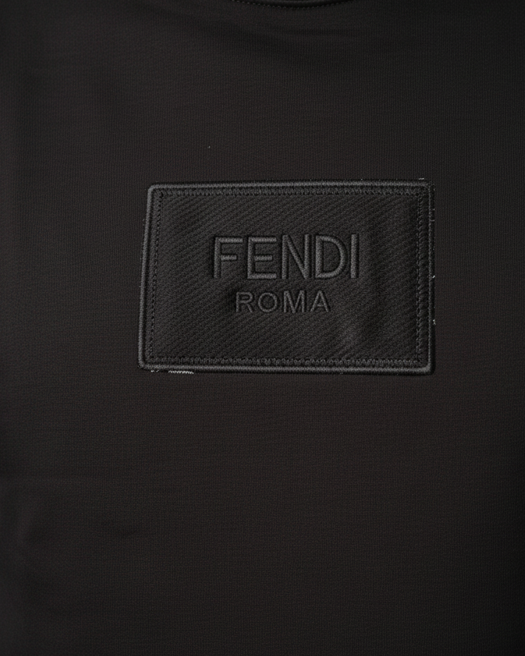 Black sweatshirt with Fendi logo on a black background
